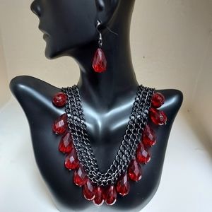 BLACK STAINLESS THREE LINK CHAIN W/SIXTEEN RUBY RED DROP CHRYSTAL BEADS